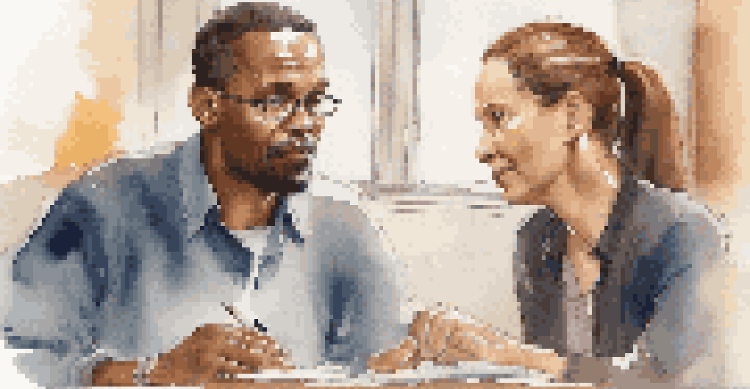 Two educators in a close-up, one listening attentively while the other speaks, surrounded by a blurred background, emphasizing their connection.