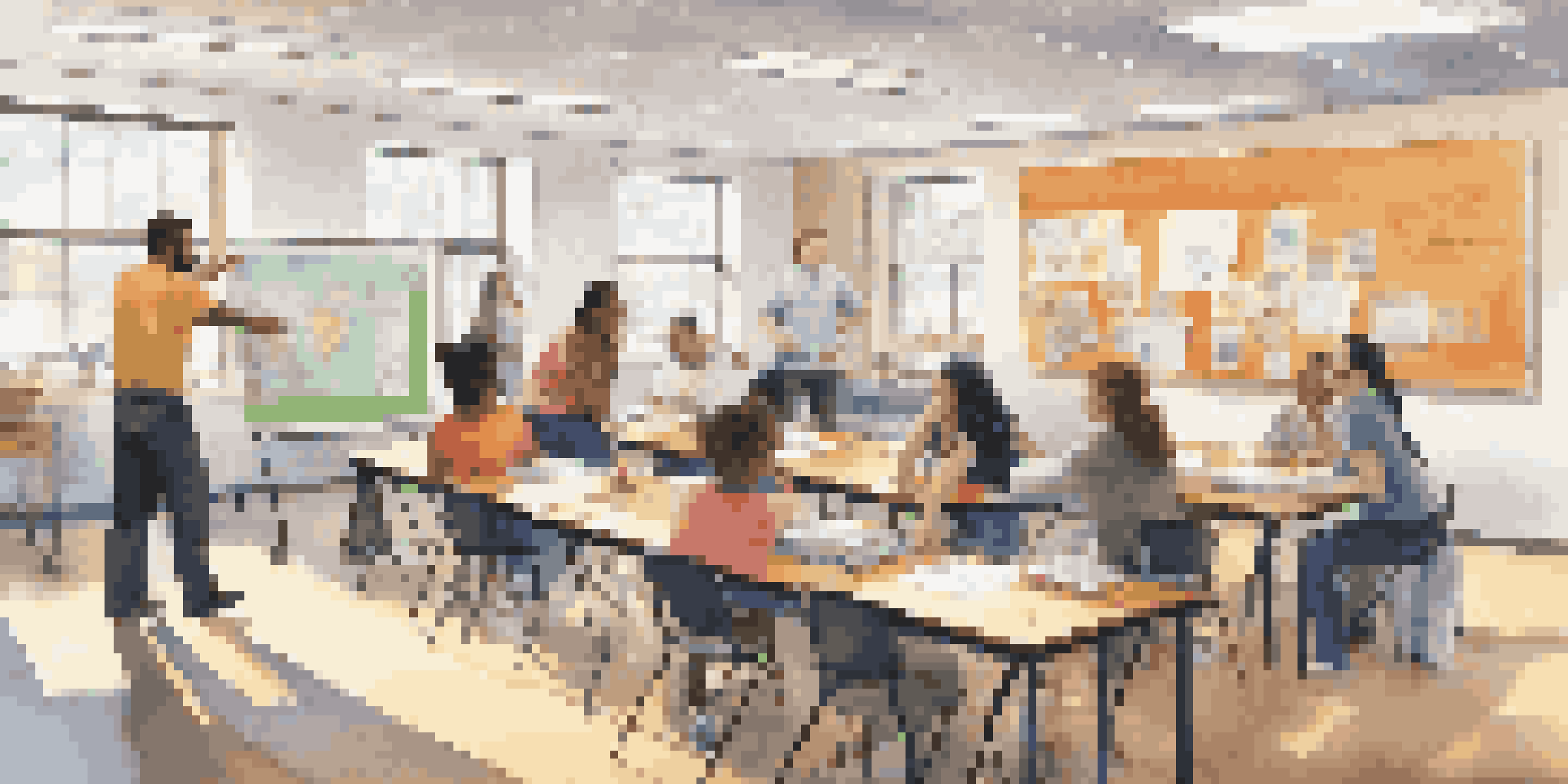 A diverse group of new teachers participating in a collaborative professional development workshop in a bright, colorful classroom.
