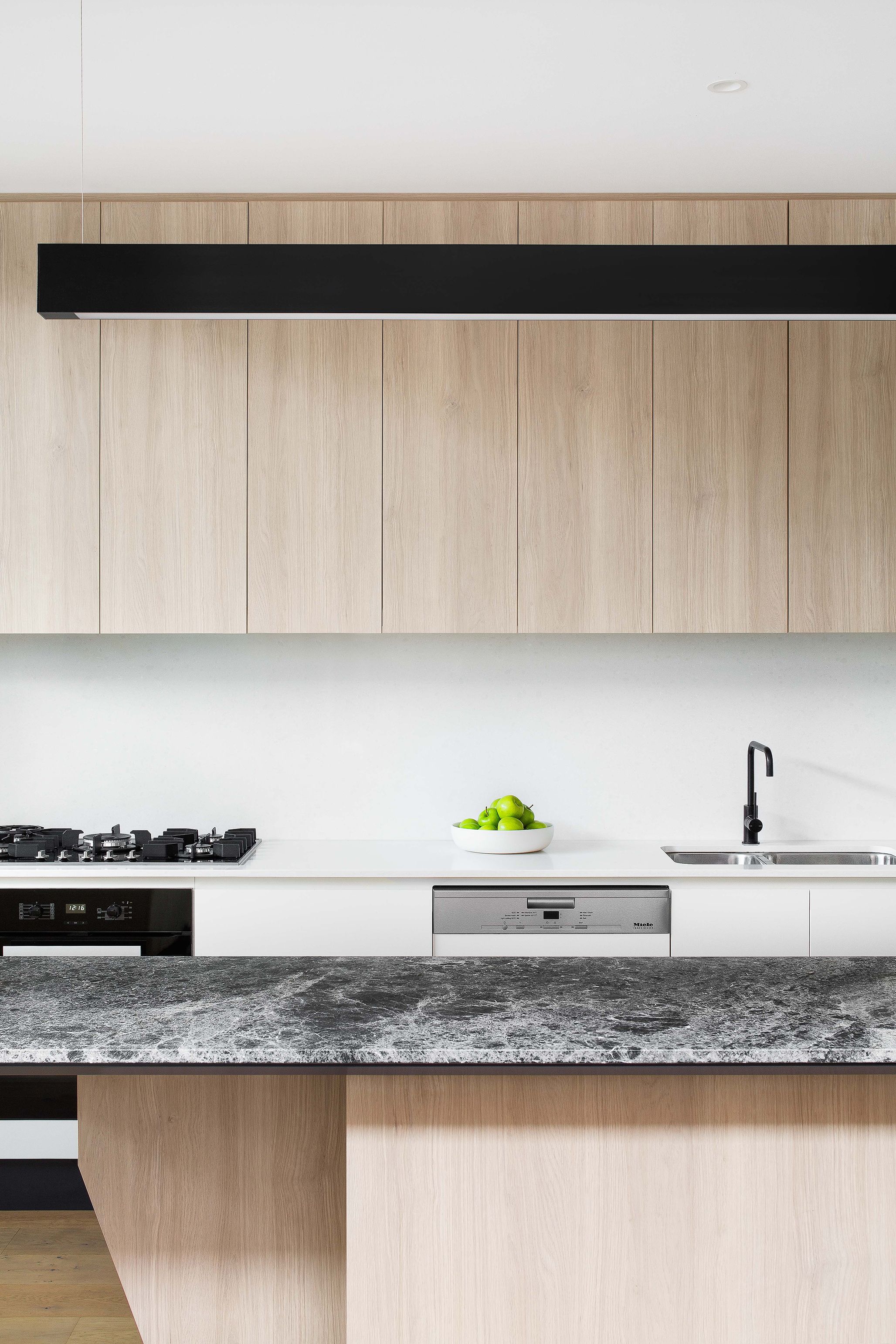 image of East Melbourne terrace - subtle and textured kitchen as part of the new addition