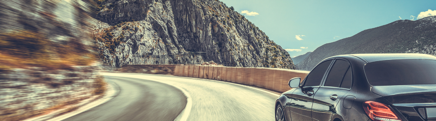 car driving on curve of a road