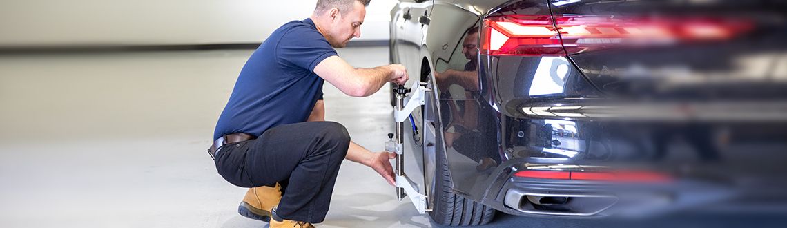 Mechanic repairing tyre