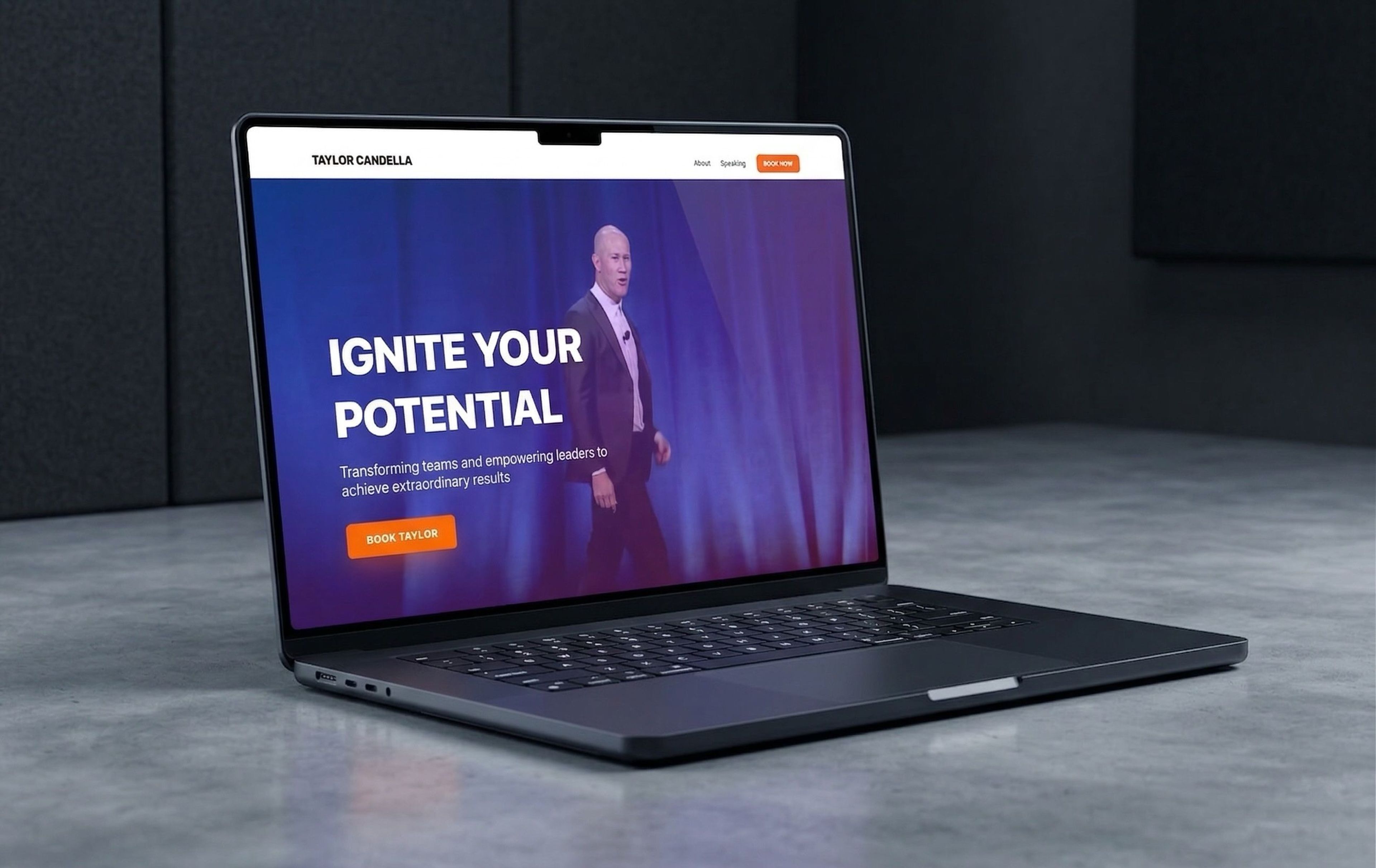 The Taylor Candella website homepage viewed on a laptop screen.