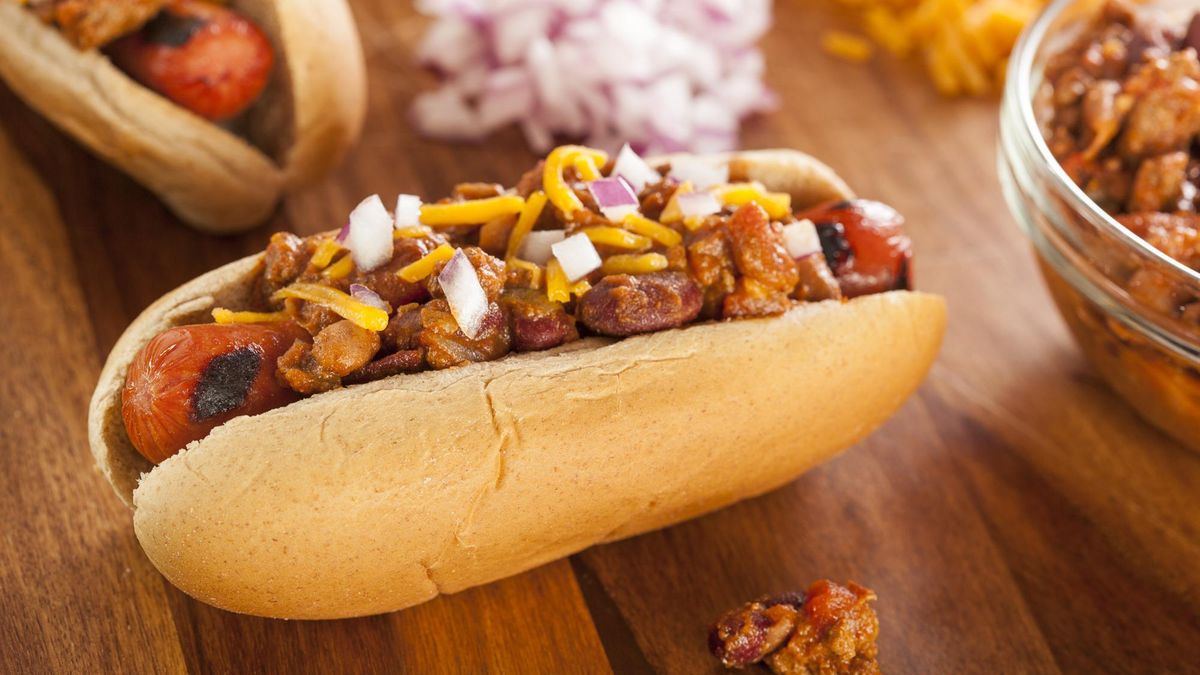 Homemade Hot Chili Dog with Cheddar Cheese and Onions