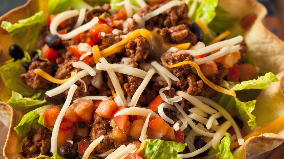 Taco Salad in a Tortilla Bowl with Beef Cheese and Lettuce