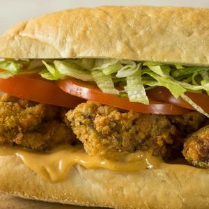 Homemade Fried Oyster Po Boy Sandwich with Lettuce and Tomato
