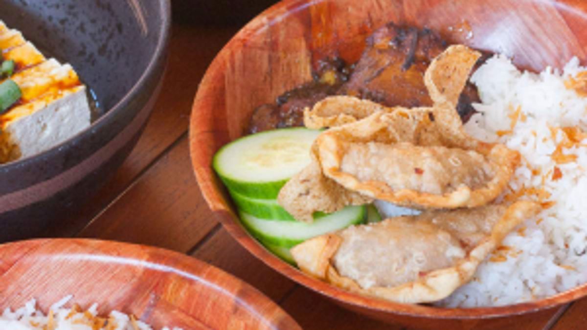 Peranakan food prepared and served on a boat