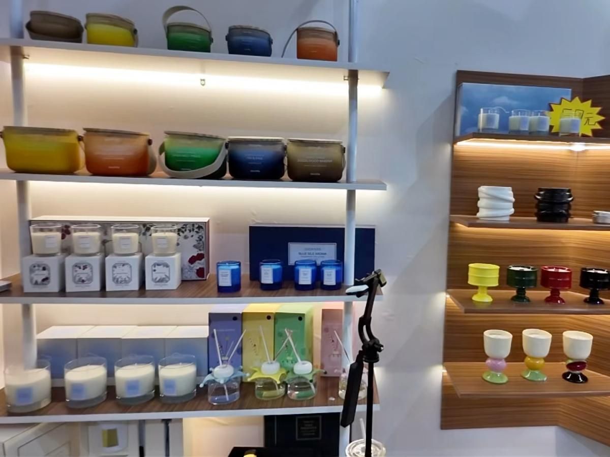 Candles displayed on a retail shelf