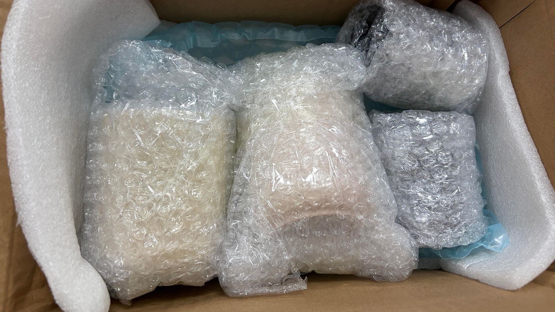 Sample candles packed and ready to courier