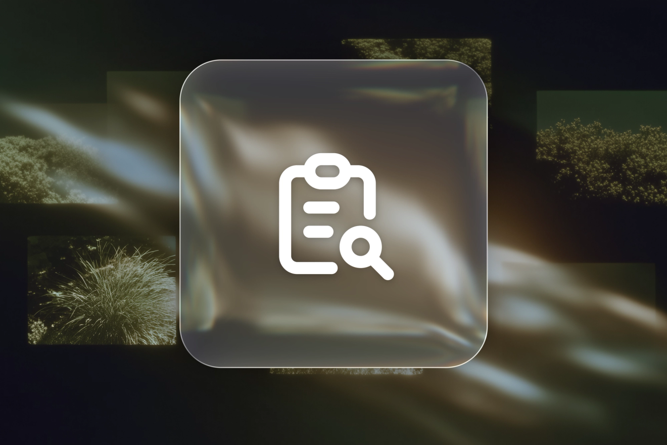 A white clipboard and magnifying glass icon on a frosted-glass tile over an abstract green landscape.