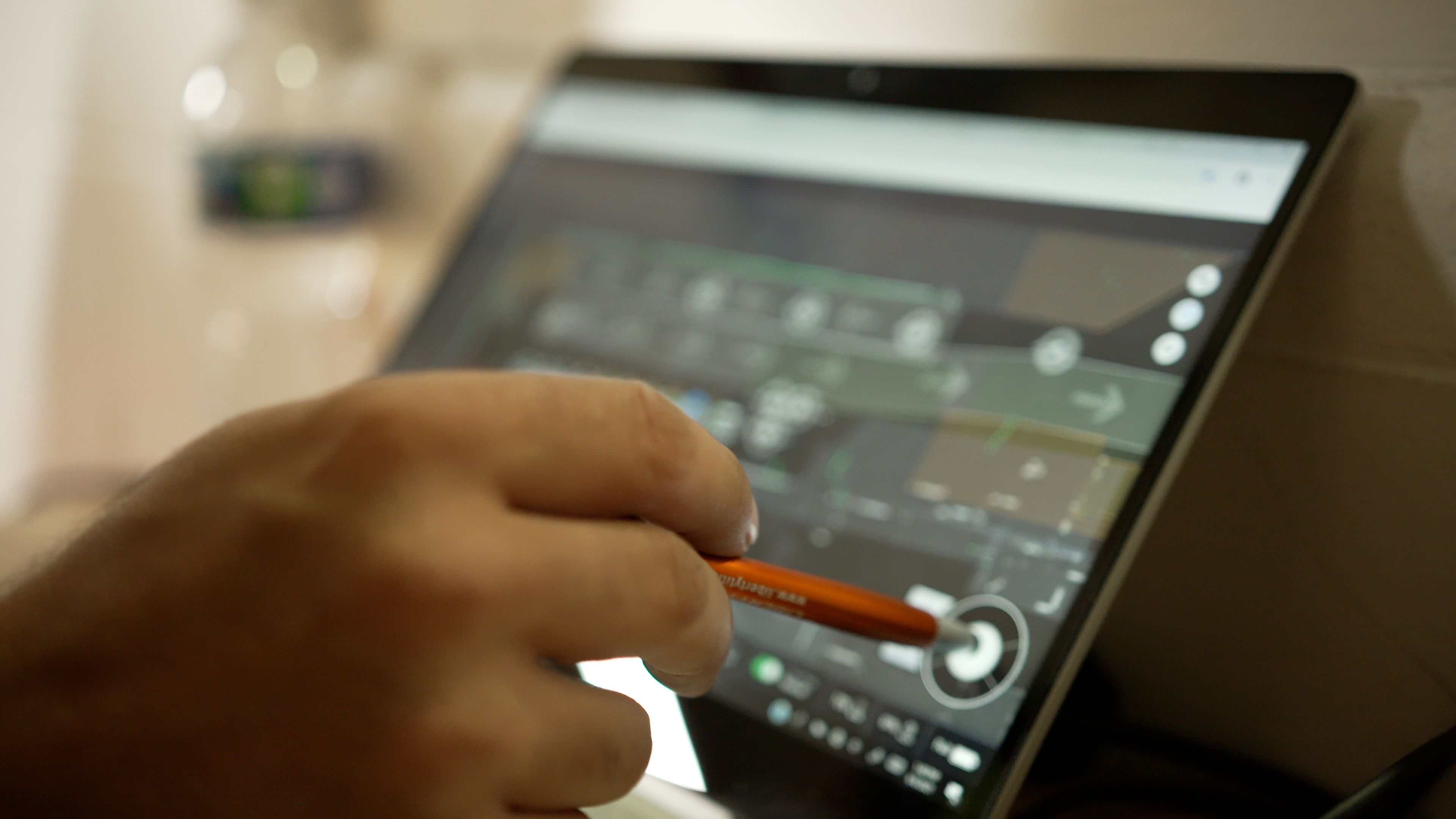 Person using tablet with OTTO Fleet Manager software