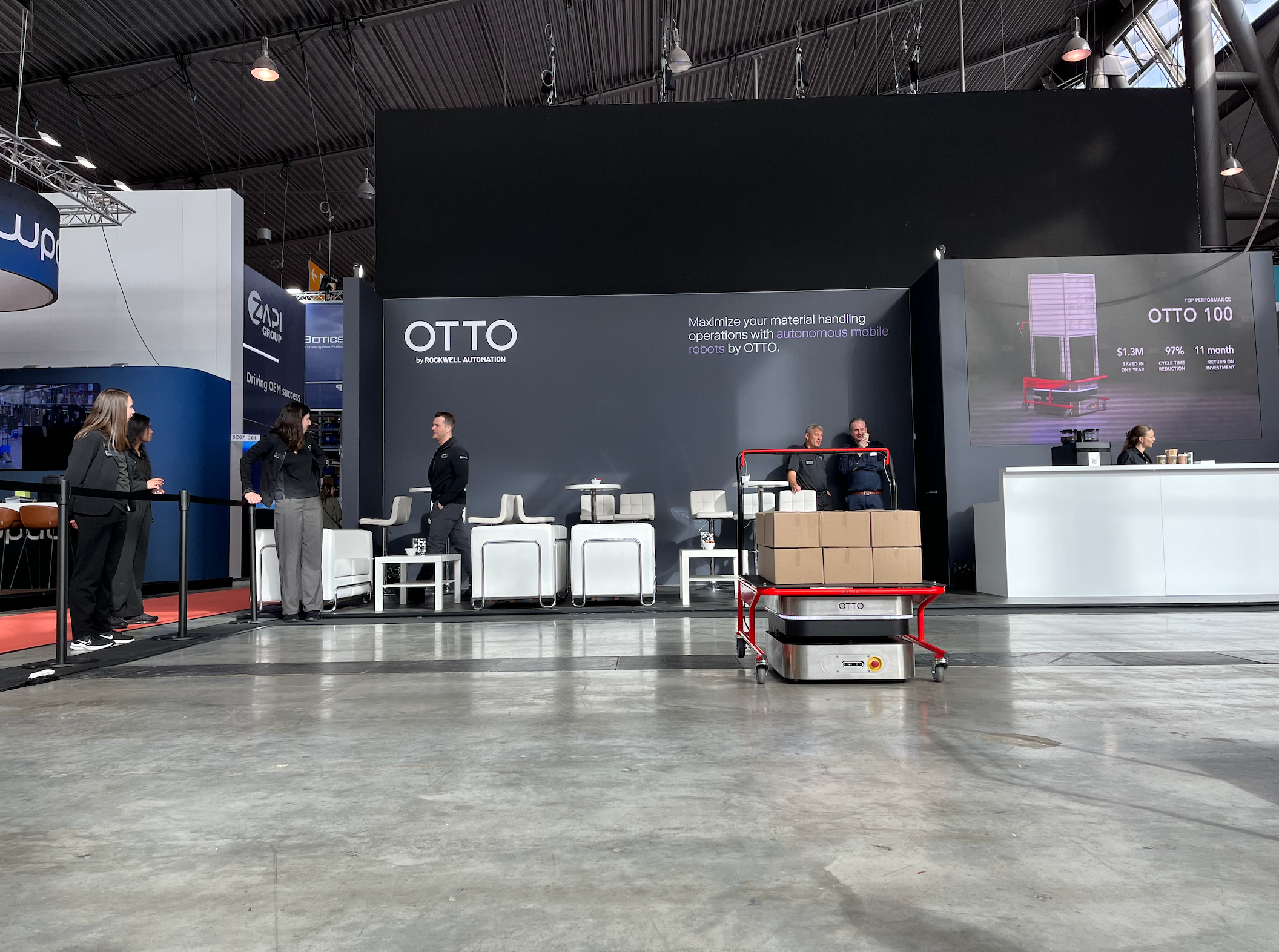 OTTO 100 driving on the trade show floor