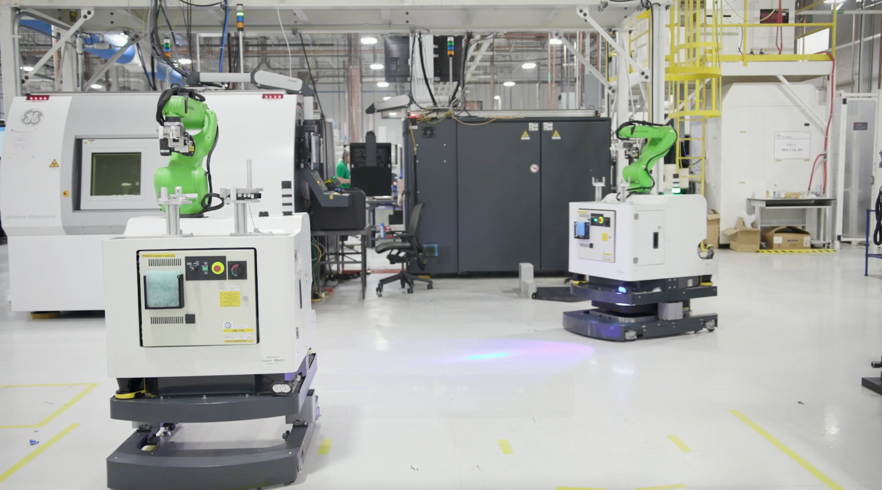 OTTO 100 autonomous mobile robot with mobile manipulation attachment moving through GE Aerospace facility