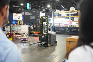 OTTO Lifter and OTTO 100 driving on the trade show floor