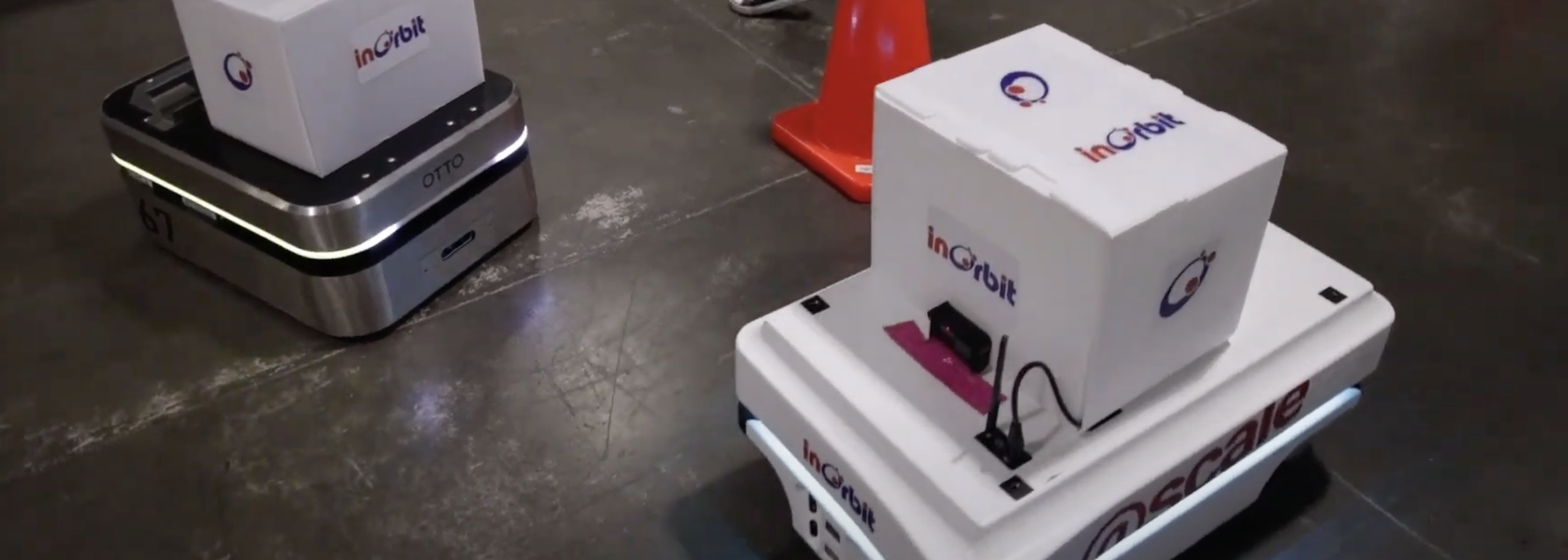 An autonomous mobile robot and automated guided vehicle working together on factory floor with VDA 5050.