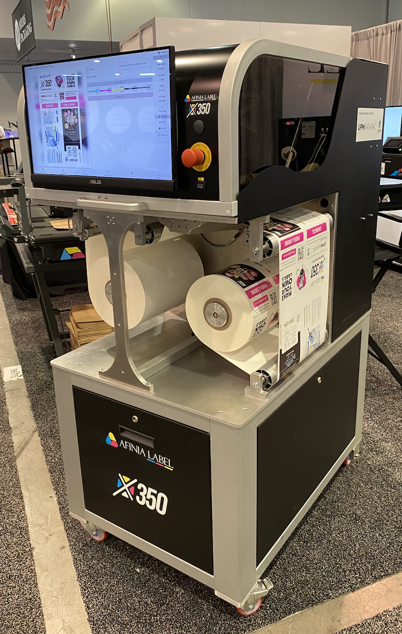 Image 2: Afinia Label showcasing their automatic label printer at PACK EXPO 2023.