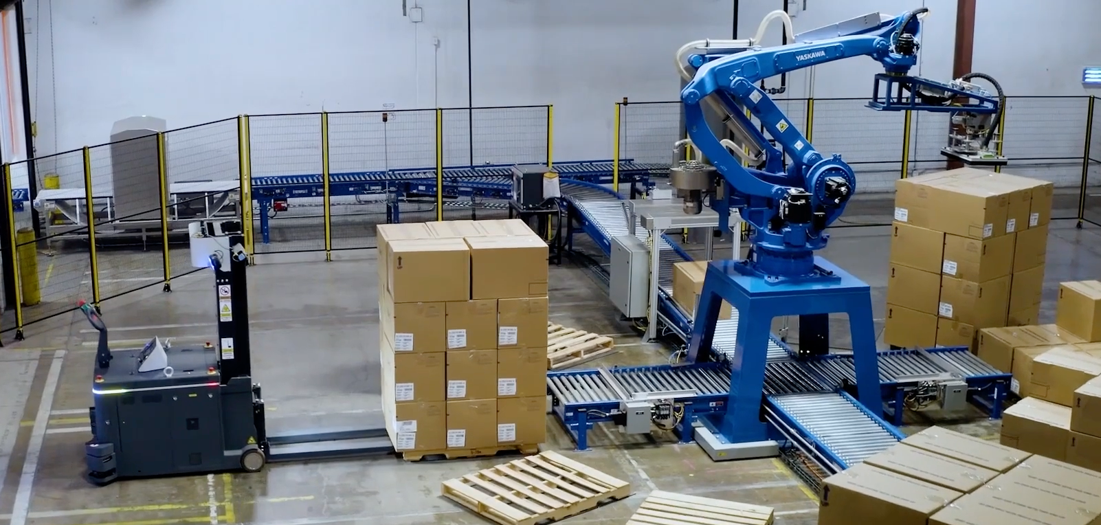 OTTO Lifter autonomous forklift picking up pallet.