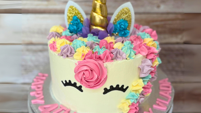 Vanilla celebration cake prepared for local delivery in Leeds