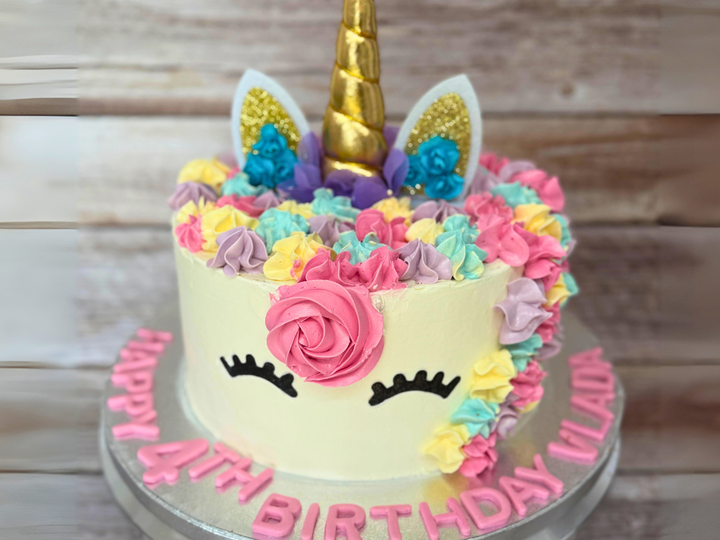 Close crop of a vanilla celebration cake suitable for Leeds delivery