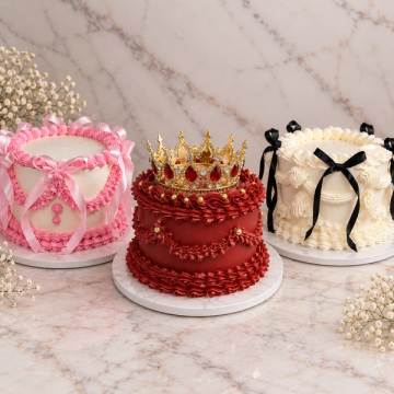Vintage birthday cake with pink piped buttercream