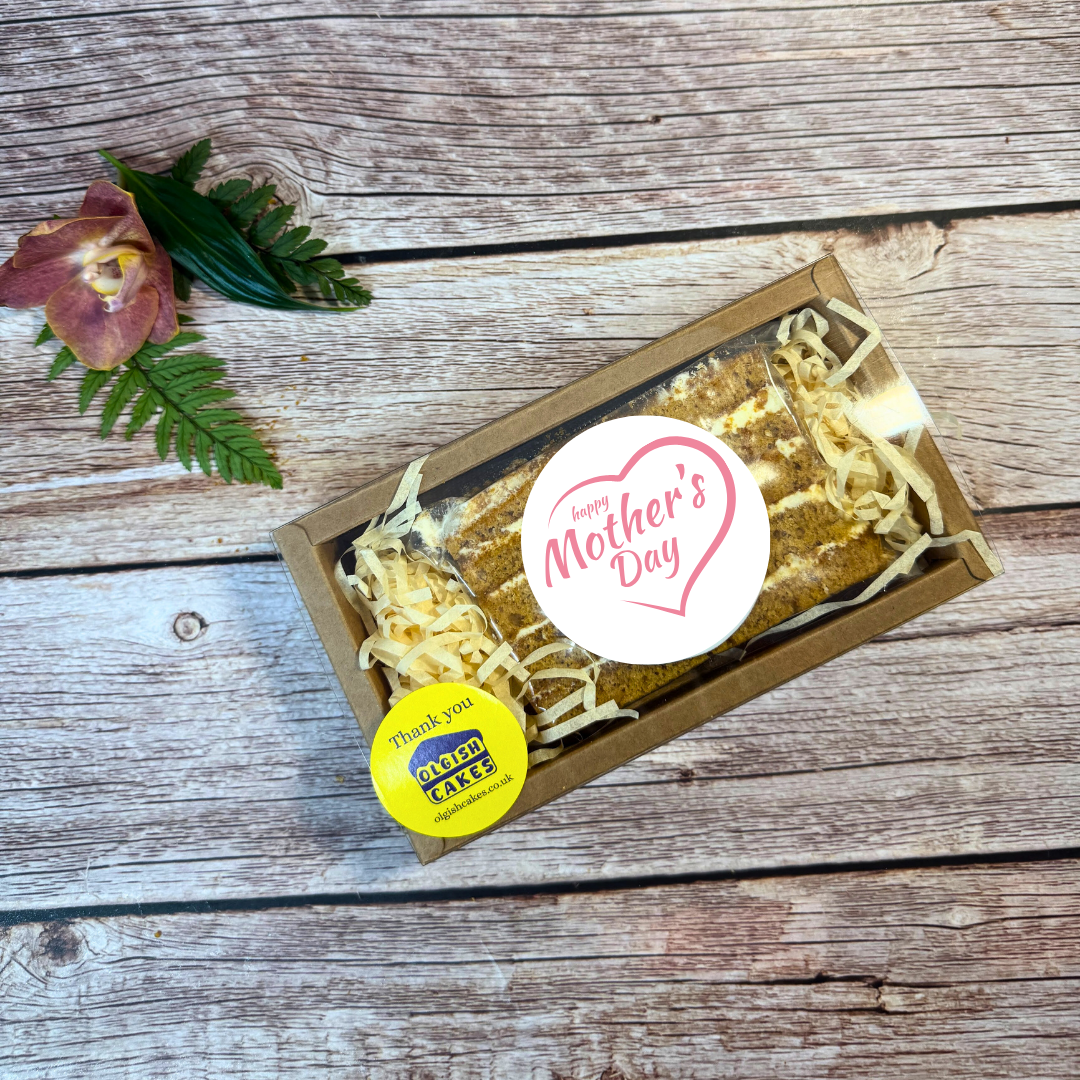 Cake for Mother’s Day honey cake slice by post in kraft gift box with “Happy Mother’s Day” sticker