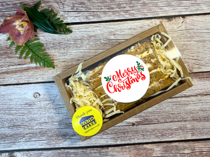 Close crop of a festive honey cake hamper for the Christmas guide