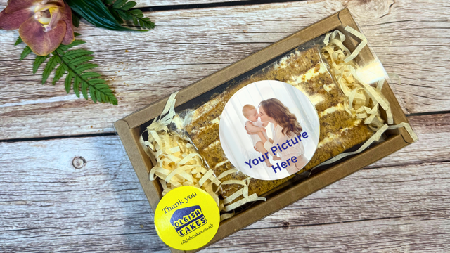 Birthday Gift by Post box with honey cake gift ready to send