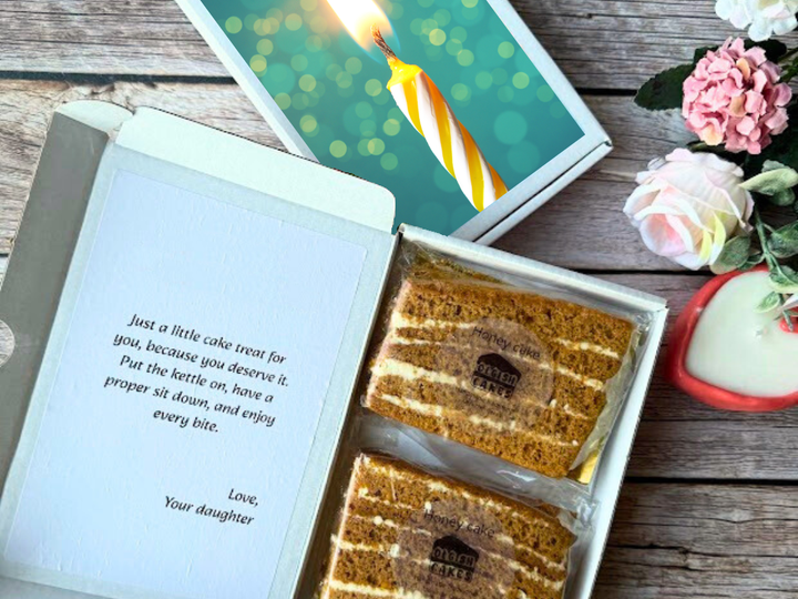 Close crop of a cake card style gift with honey cake slices