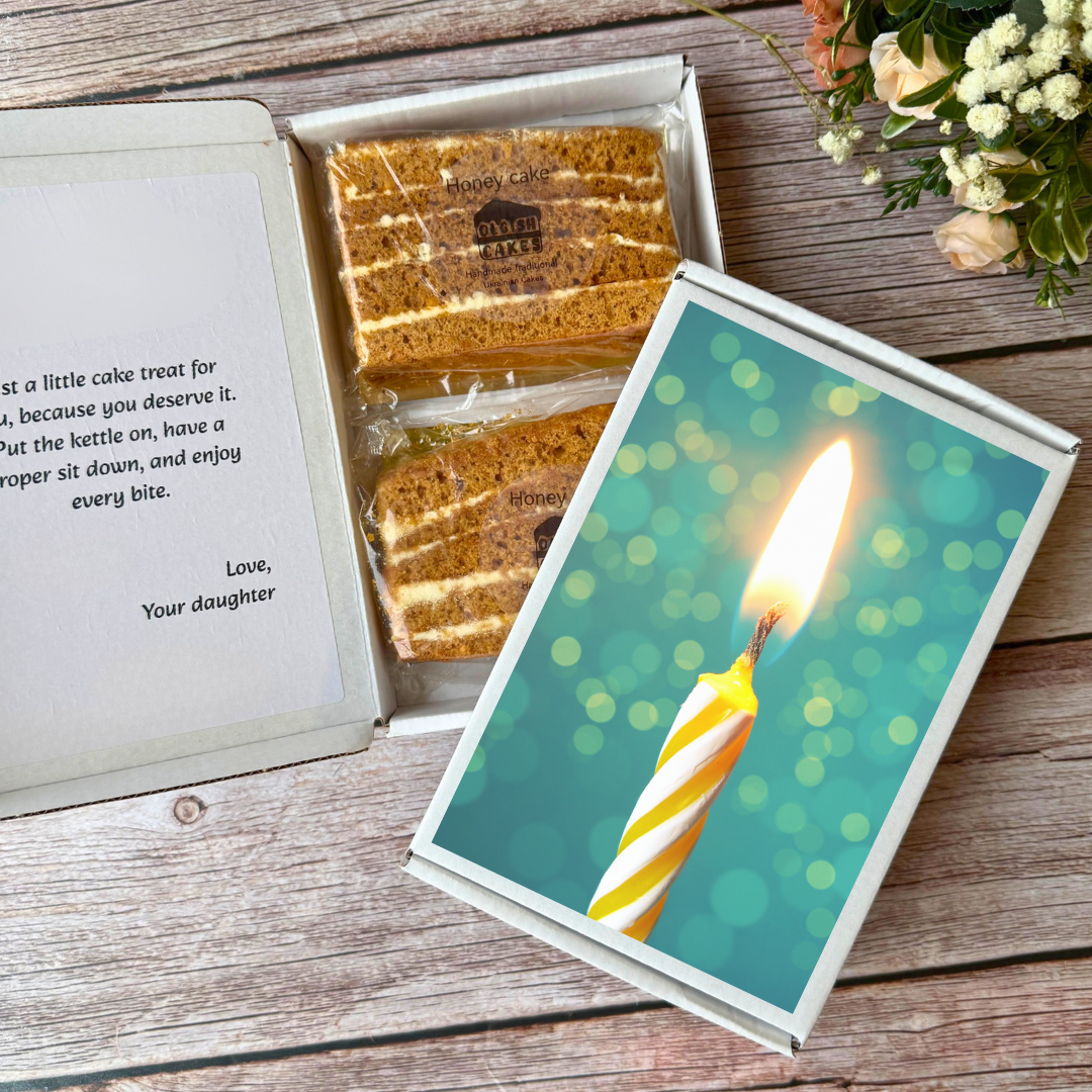 Send a box with two cake slices by post — the perfect alternative to a postcard