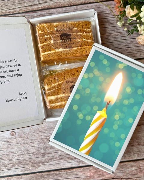 Send a box with two cake slices by post — the perfect alternative to a postcard