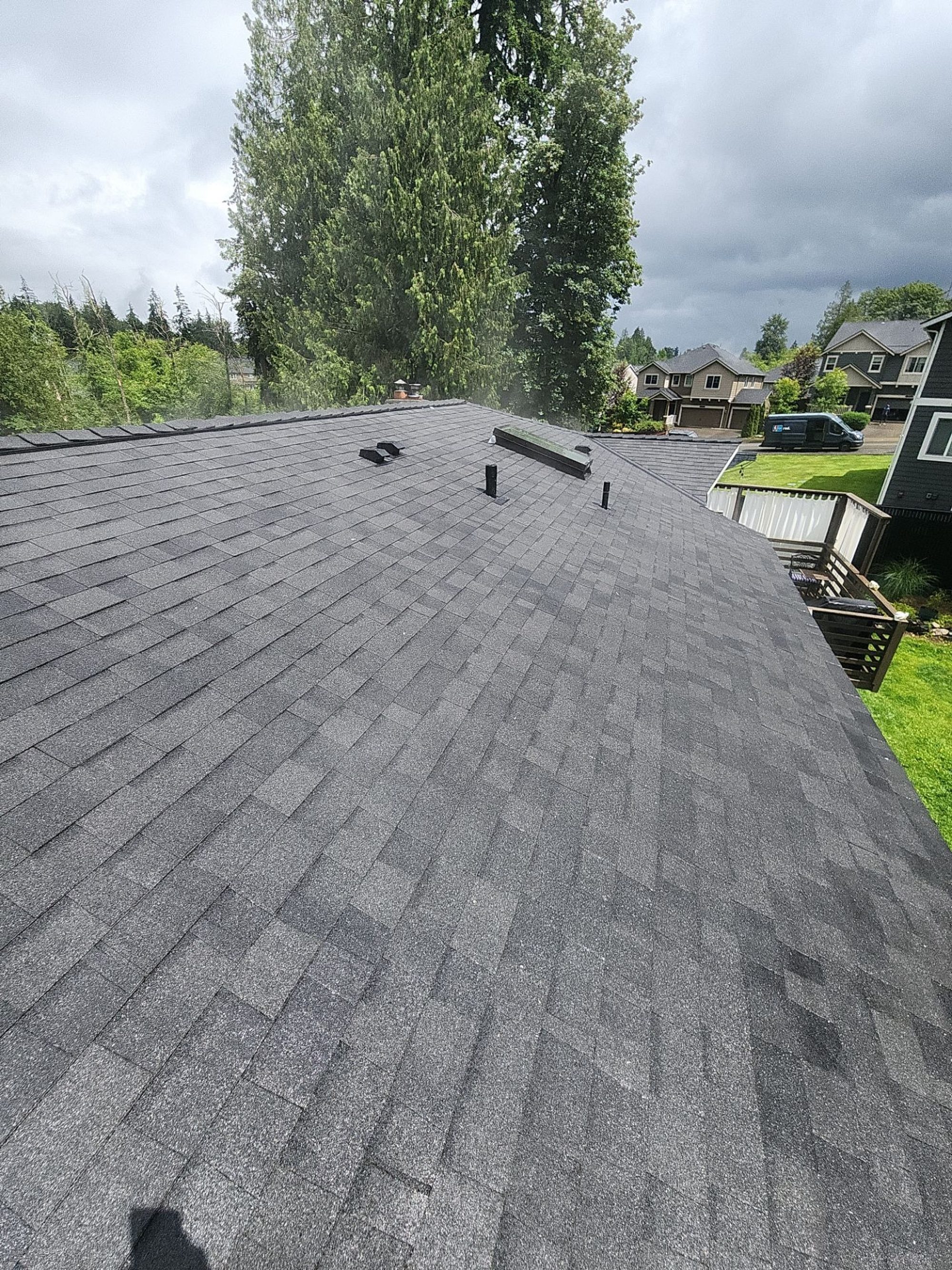 Amor Roofing Midnight Black asphalt roof in Lake Stevens, after roof plane neighborhood