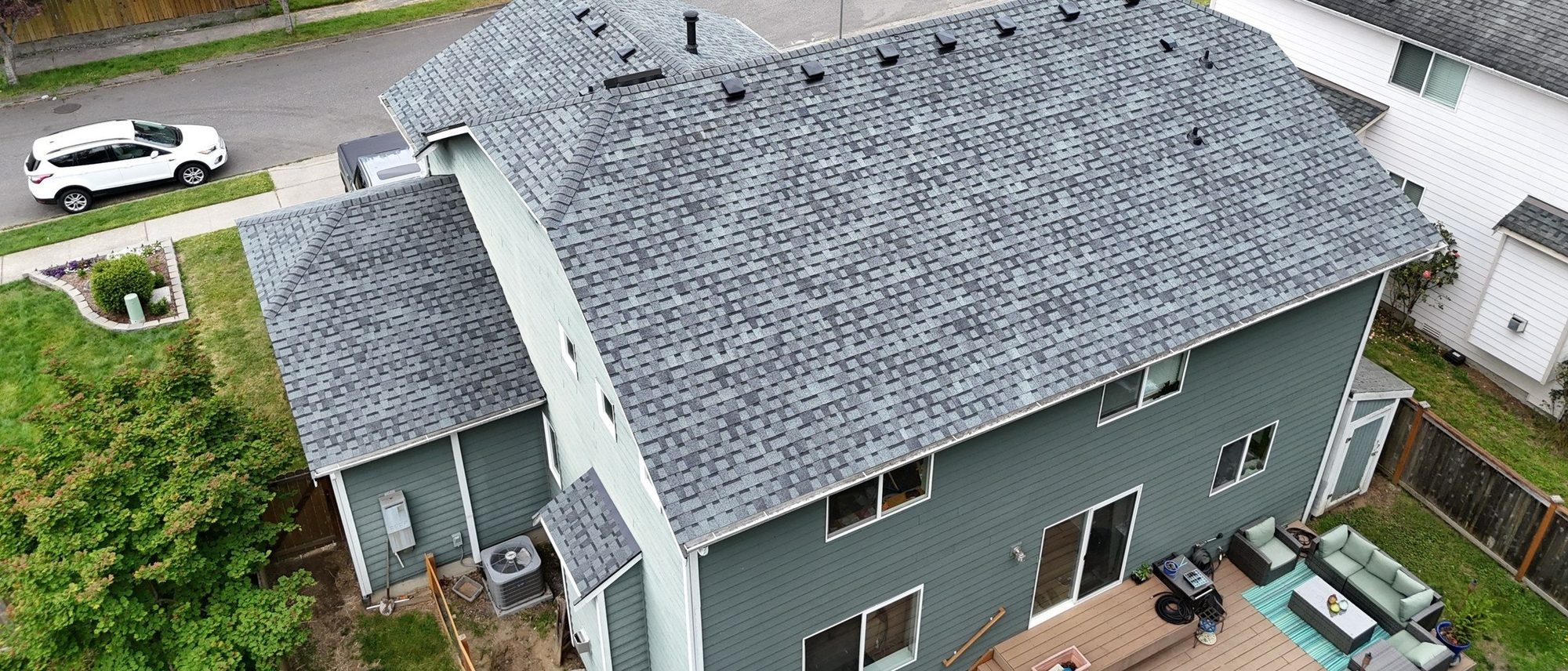 Rear aerial of the Pabco Premier Pewter Gray asphalt shingle roof and the back yard, Marysville, WA