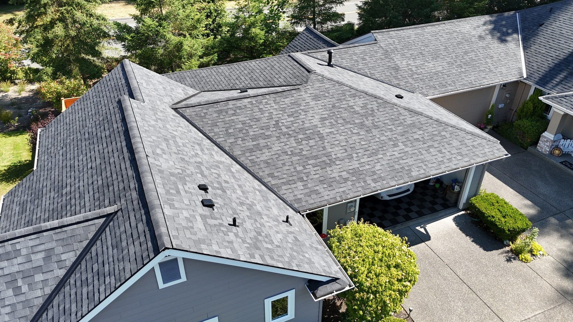 Aerial of the finished Malarkey Highlander Midnight Black asphalt shingle roof from the side, Redmond, WA