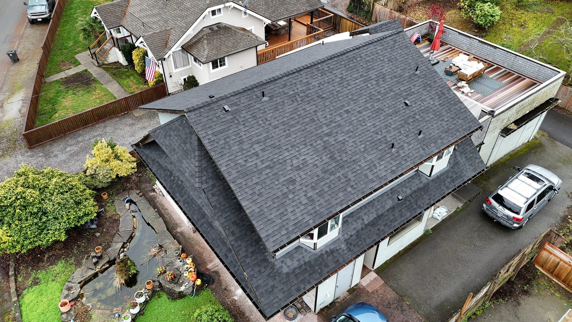 Amor Roofing Midnight Black asphalt roof in Everett, aerial finished roof