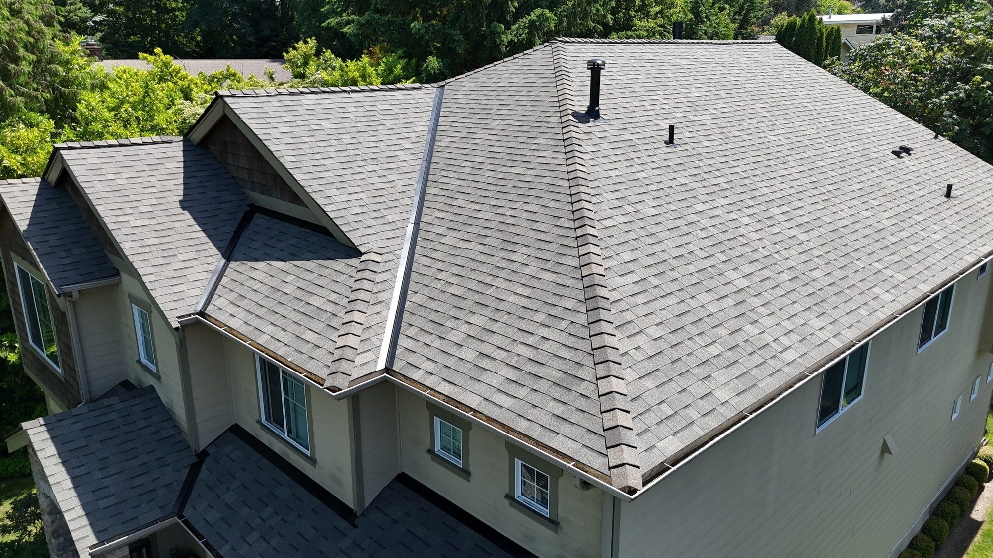 Drone view of the finished Malarkey Vista Weathered Wood asphalt shingle roof, Kenmore, WA, by Amor Roofing