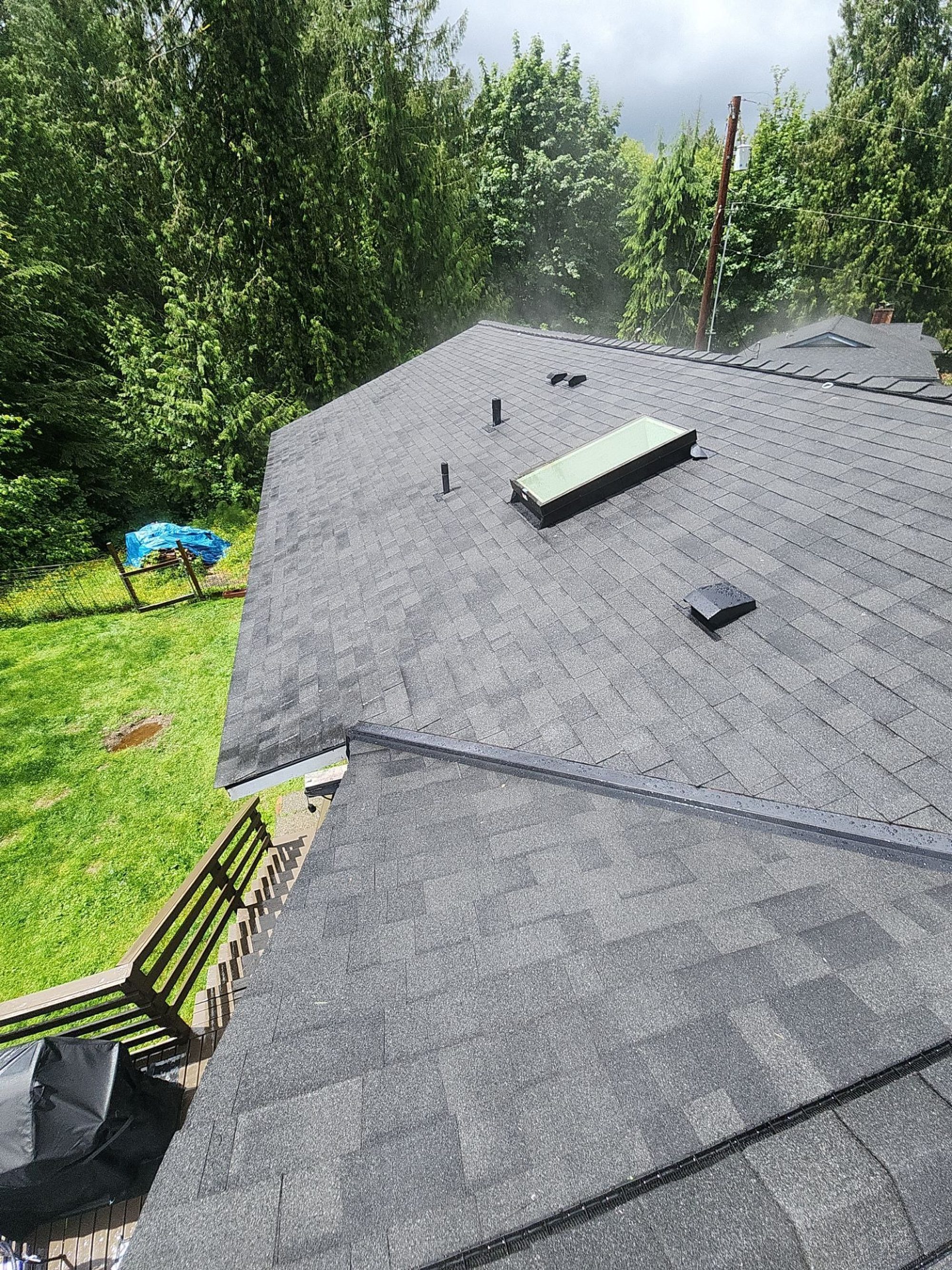 Amor Roofing Midnight Black asphalt roof in Lake Stevens, after roof plane skylight