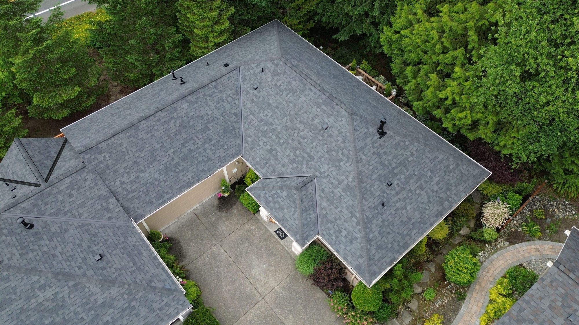 Drone view of the finished Malarkey Legacy Midnight Black asphalt shingle roof, Redmond, WA, by Amor Roofing