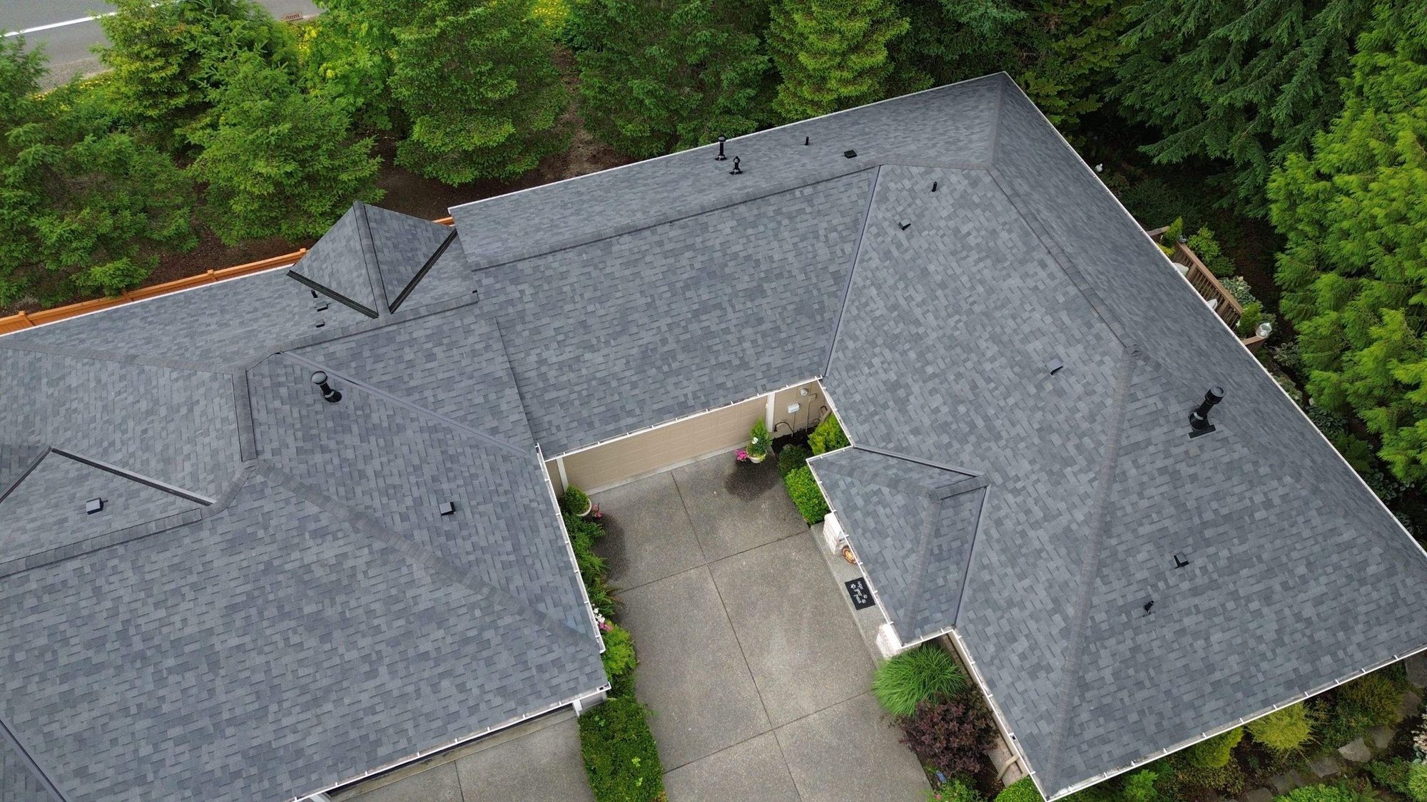 Drone view of the finished Malarkey Legacy Midnight Black asphalt shingle roof, Redmond, WA, by Amor Roofing