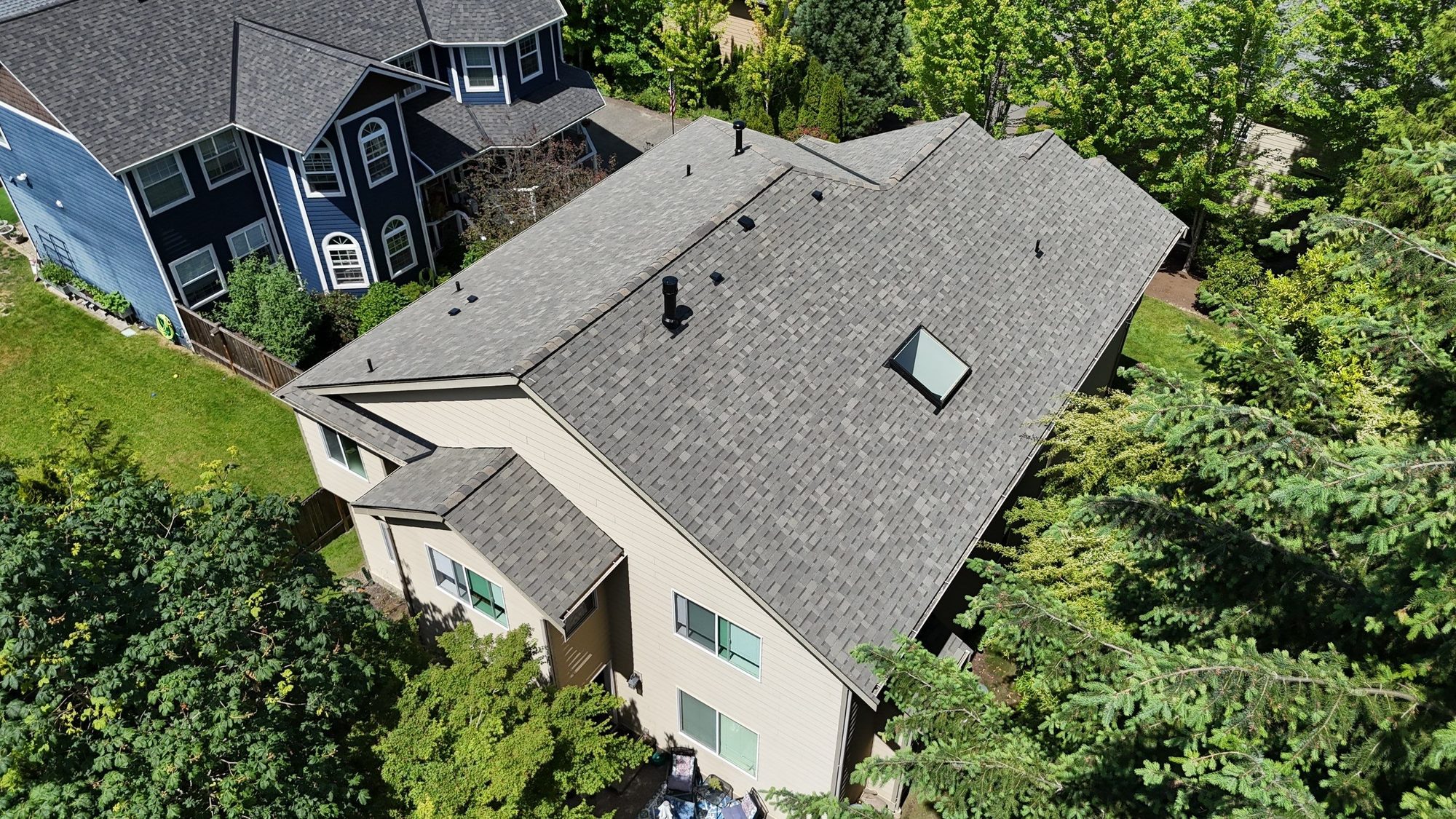 Amor Roofing Weathered Wood asphalt roof in Kenmore, drone three quarter weathered wood