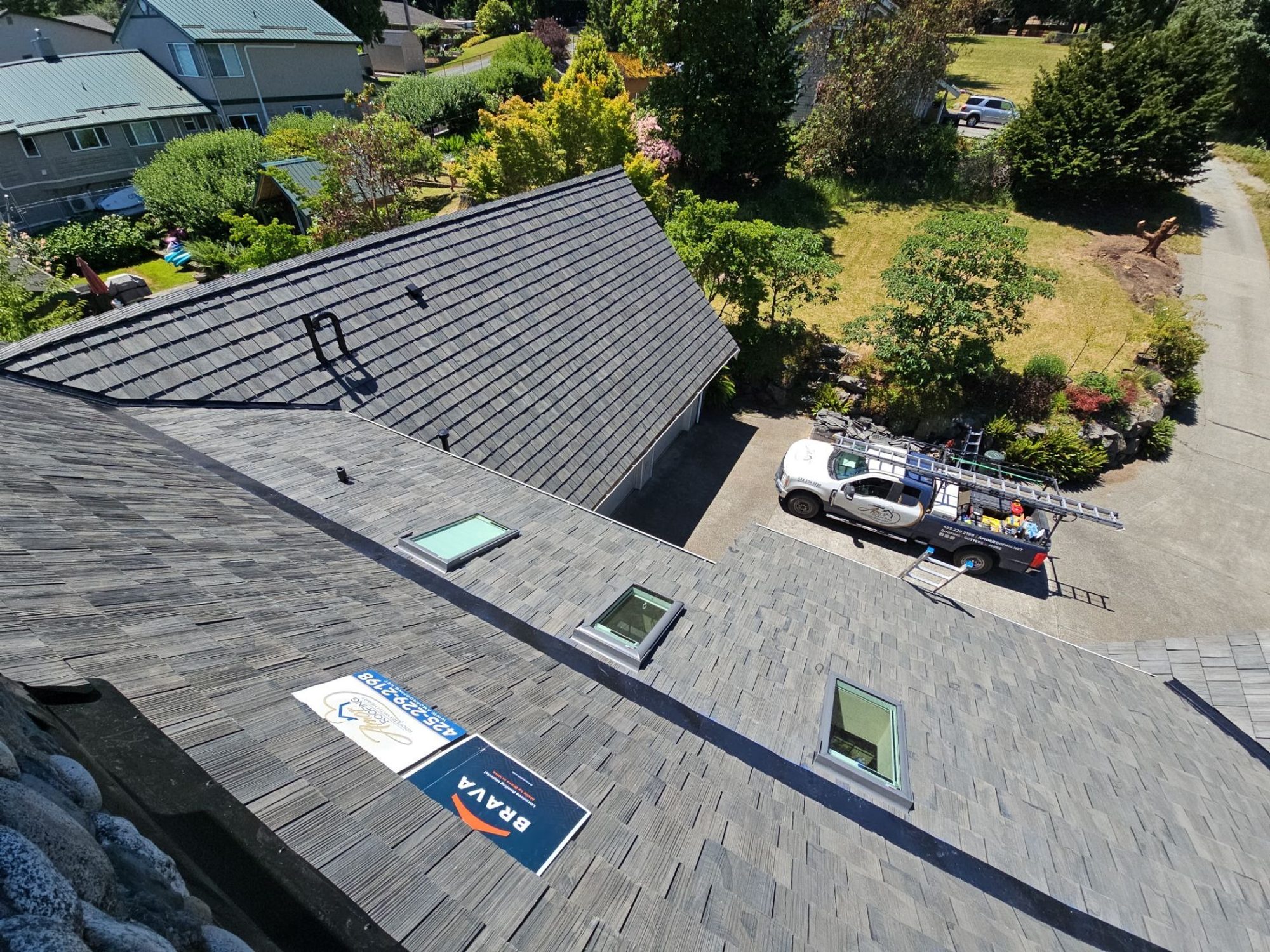 Drone view of the completed Brava Canyon Gray composite shake roof with new skylights, Stanwood, WA, by Amor Roofing