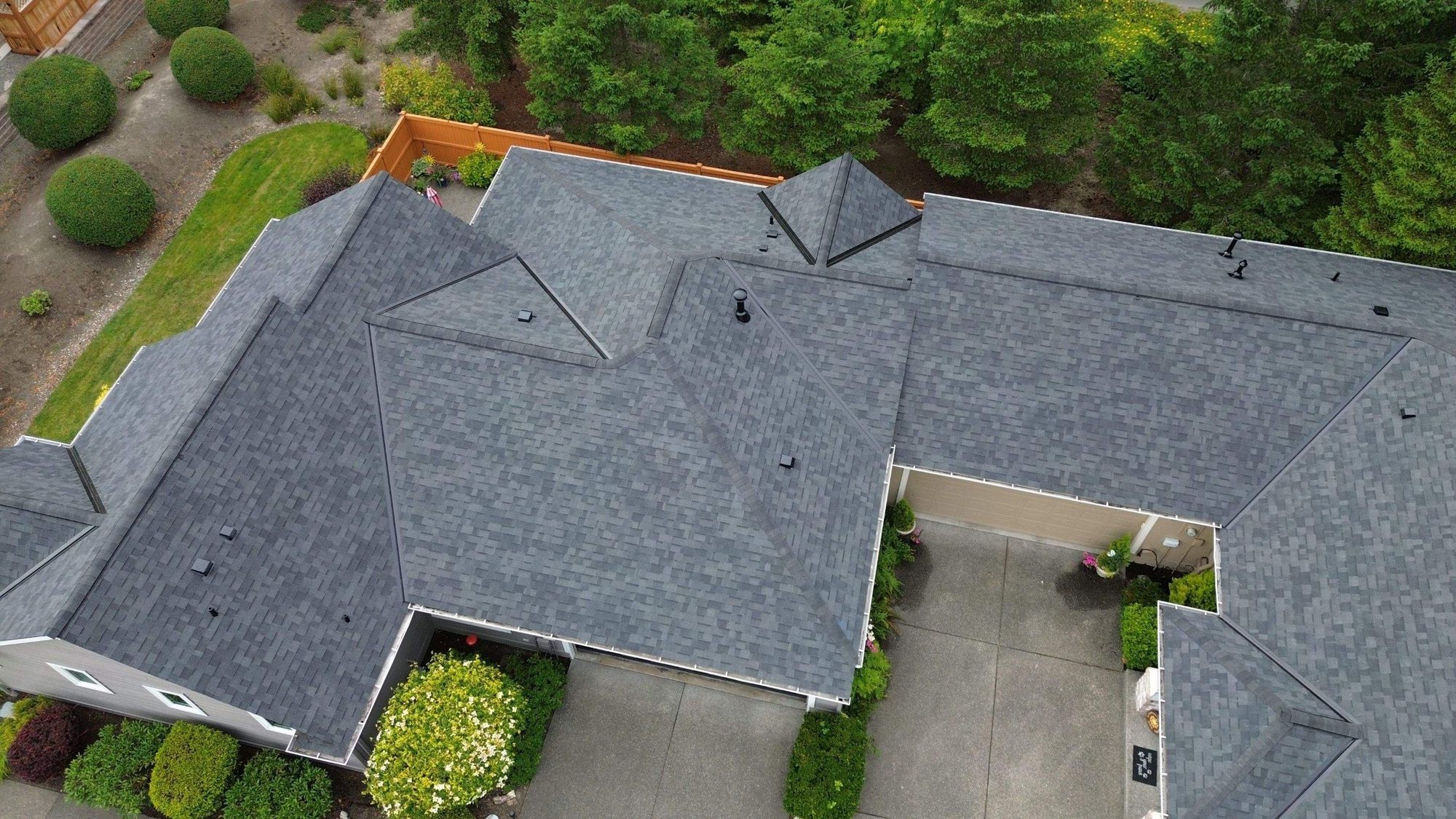 Drone view of the finished Malarkey Legacy Midnight Black asphalt shingle roof, Redmond, WA, by Amor Roofing