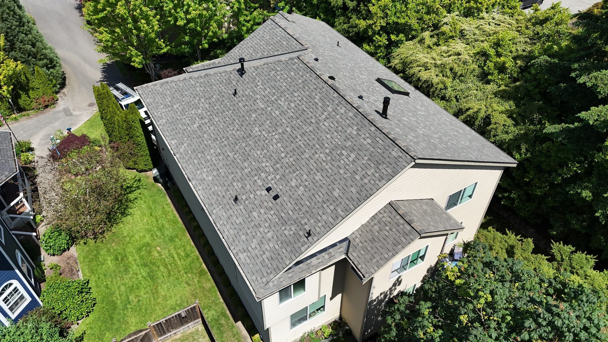 Amor Roofing Weathered Wood asphalt roof in Kenmore, drone corner aerial