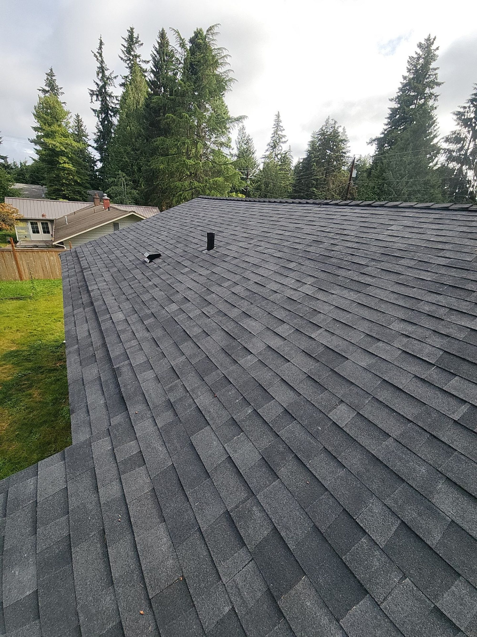 Amor Roofing Midnight Black asphalt roof in Edmonds, a roof wide