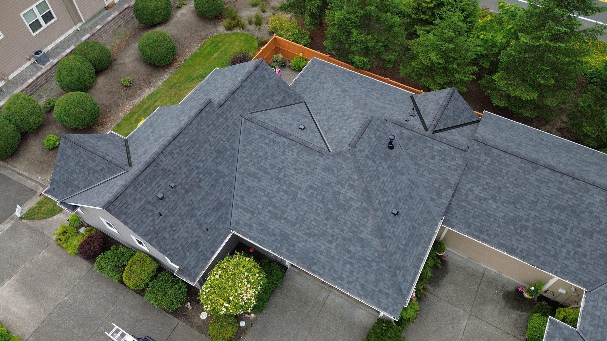 Drone view of the finished Malarkey Legacy Midnight Black asphalt shingle roof, Redmond, WA, by Amor Roofing