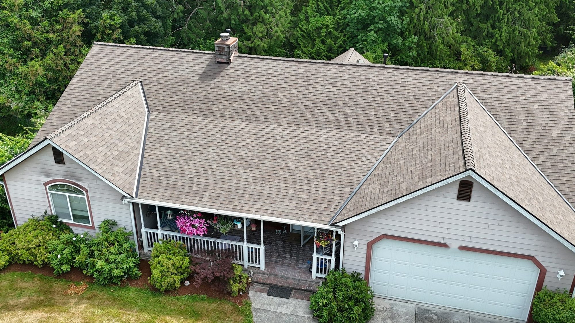 Drone view of the completed Malarkey Heather Grey asphalt shingle roof on a Lake Stevens, WA home by Amor Roofing