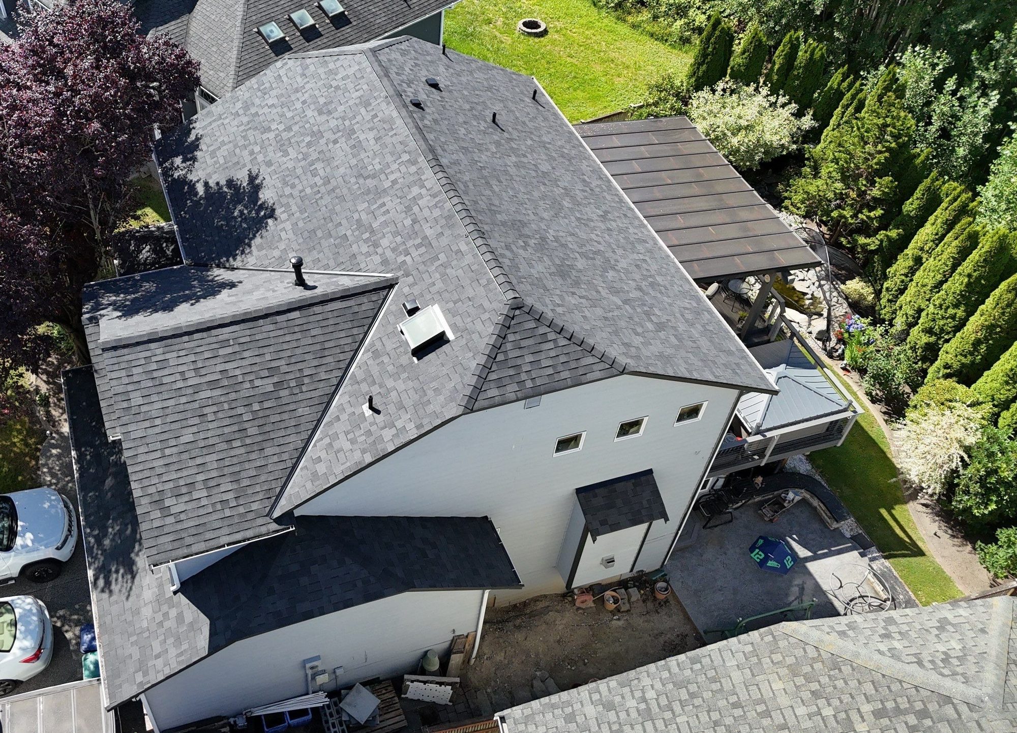 Drone view of the finished Malarkey Midnight Black asphalt shingle roof, Marysville, WA, by Amor Roofing