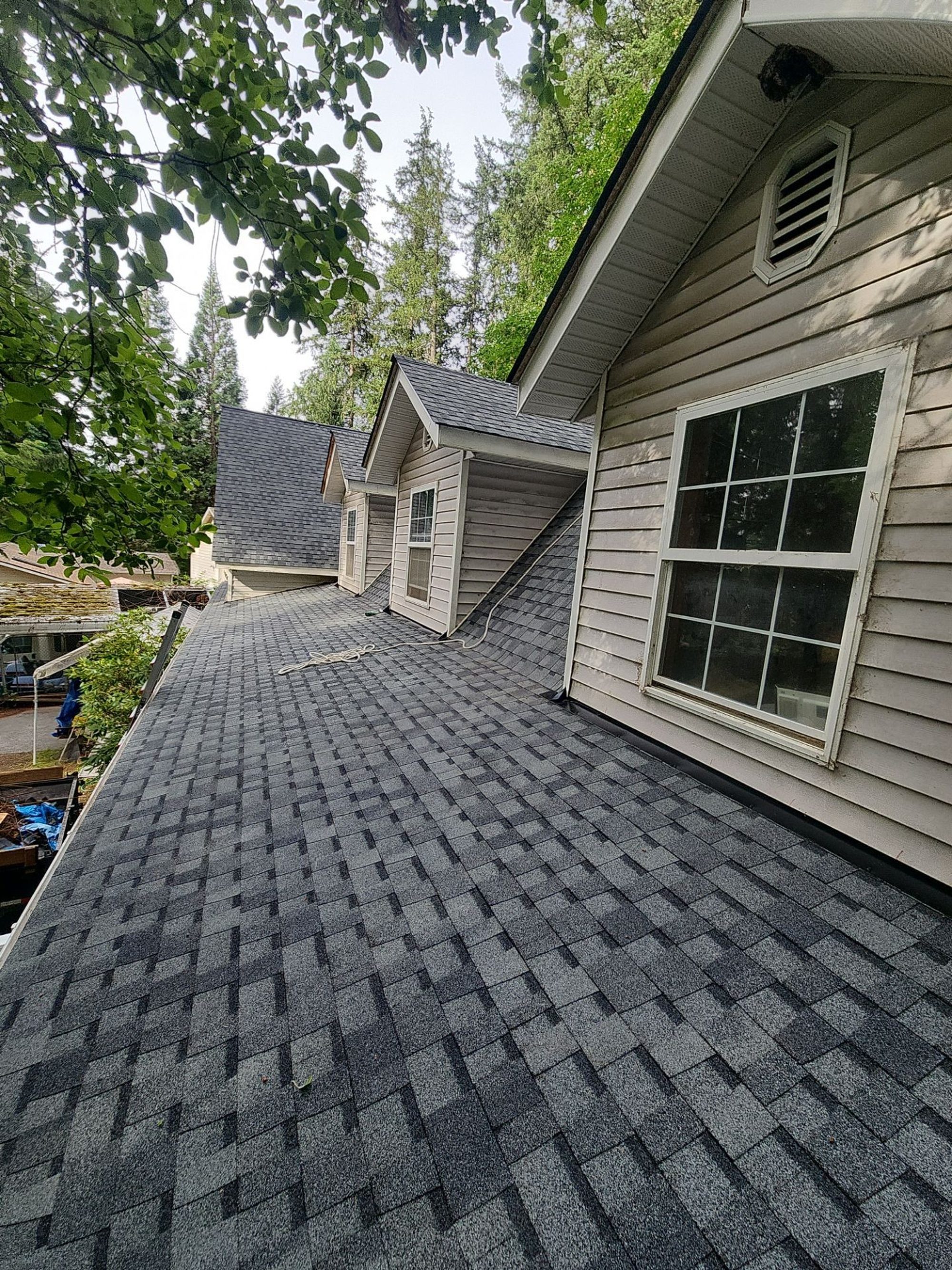 Finished Pabco Premier Pewter Gray asphalt shingle roof beside the dormer, Lake Stevens, WA