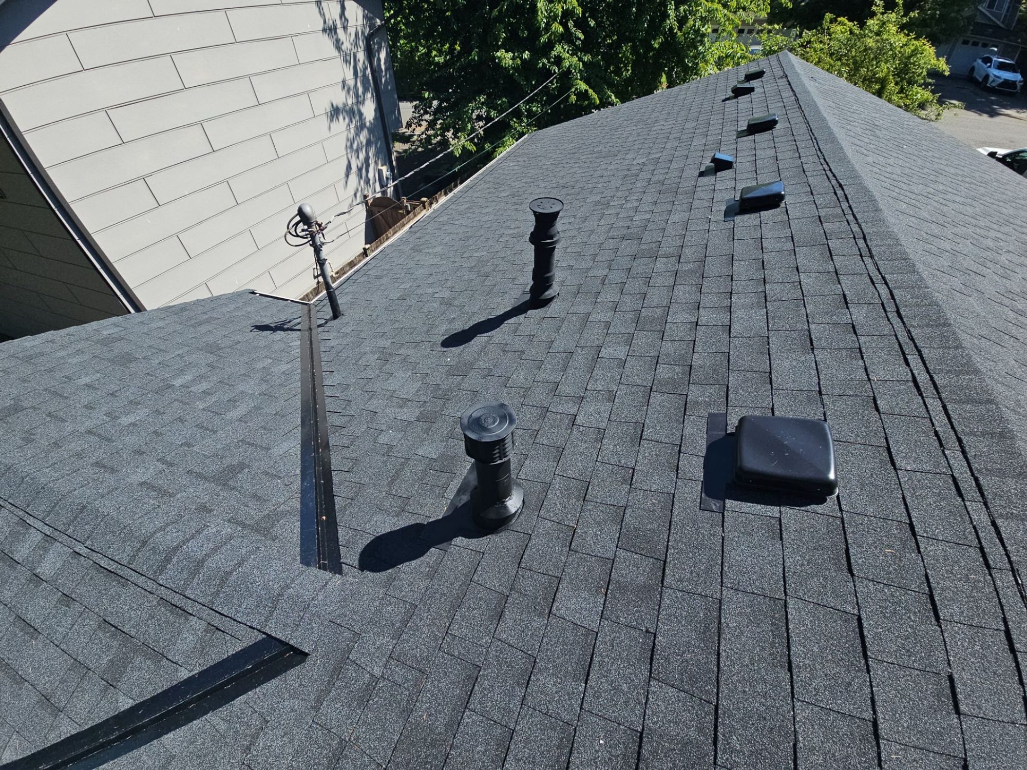 Amor Roofing Antique Black asphalt roof in Everett, a ridge detail