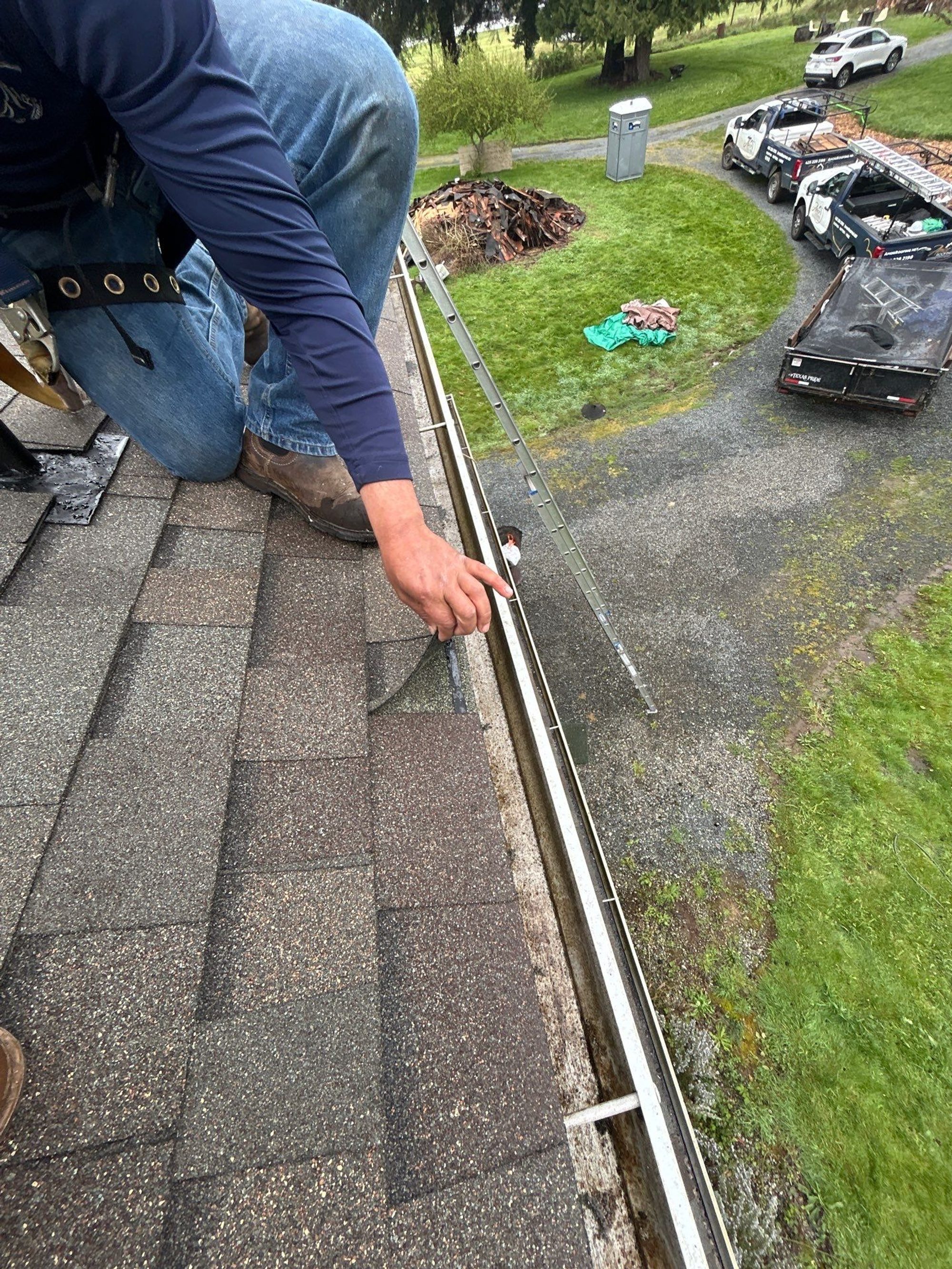 Amor Roofing crew member finishing detail work on the new Snohomish roof