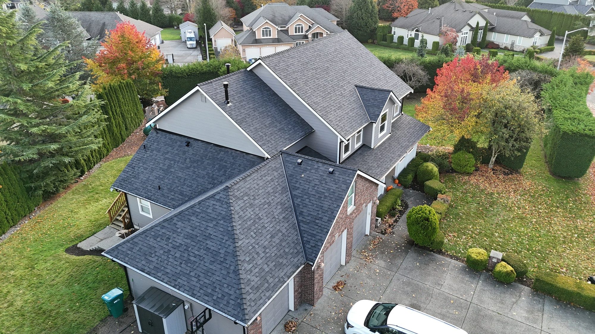 Aerial view of a finished asphalt shingle roof in Snohomish, WA, photo 1