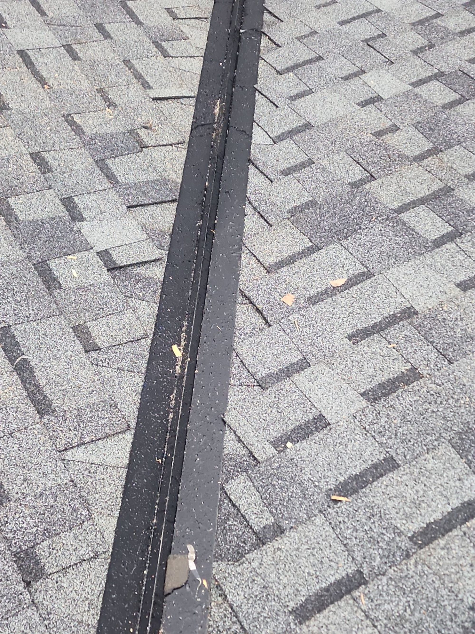 Amor Roofing Pewter Gray asphalt roof in Arlington, valley flashing detail
